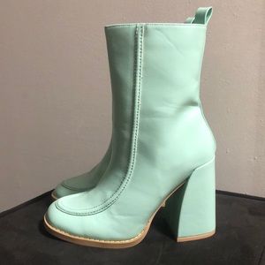 NWT Heeled sock boots